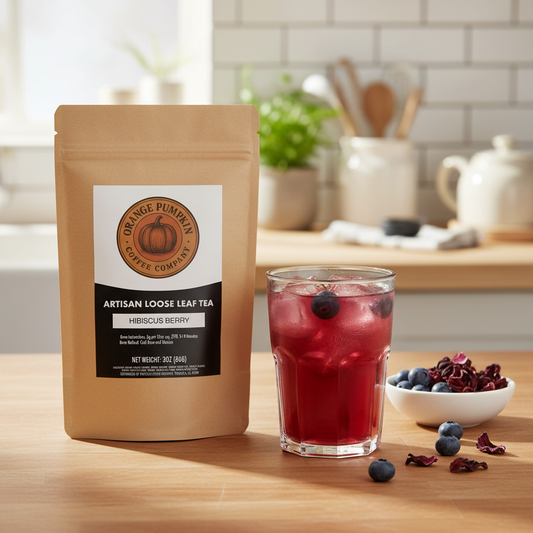 Cup of refreshing Hibiscus Berry Tea with organic hibiscus flowers and berry flavors