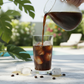 Glass of cold brew coffee with chocolate, toffee, and floral tones